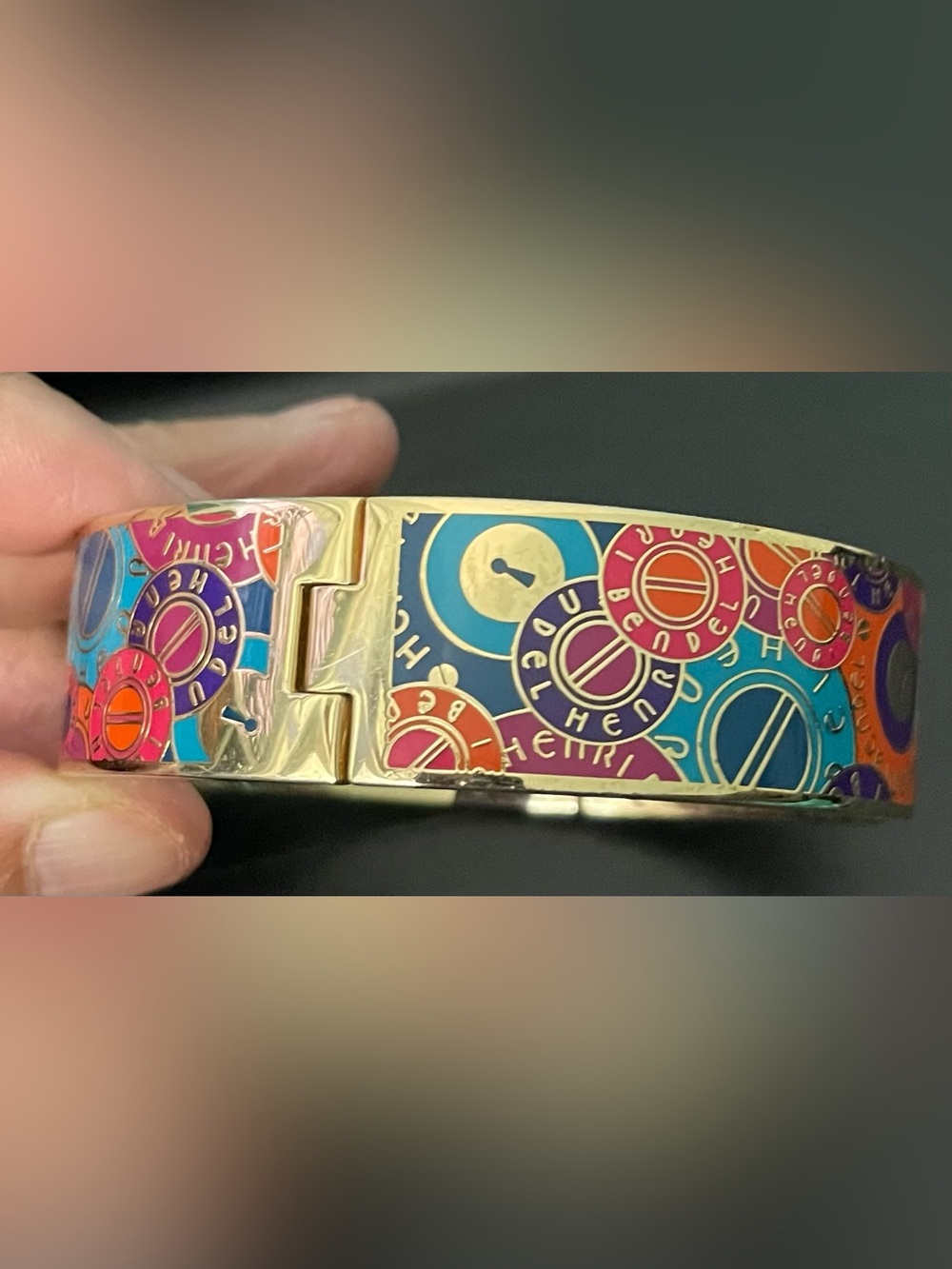 henri bendel Gold-Tone Multicolor Enamel Logo Disc Bangle - Picture 3 of 3